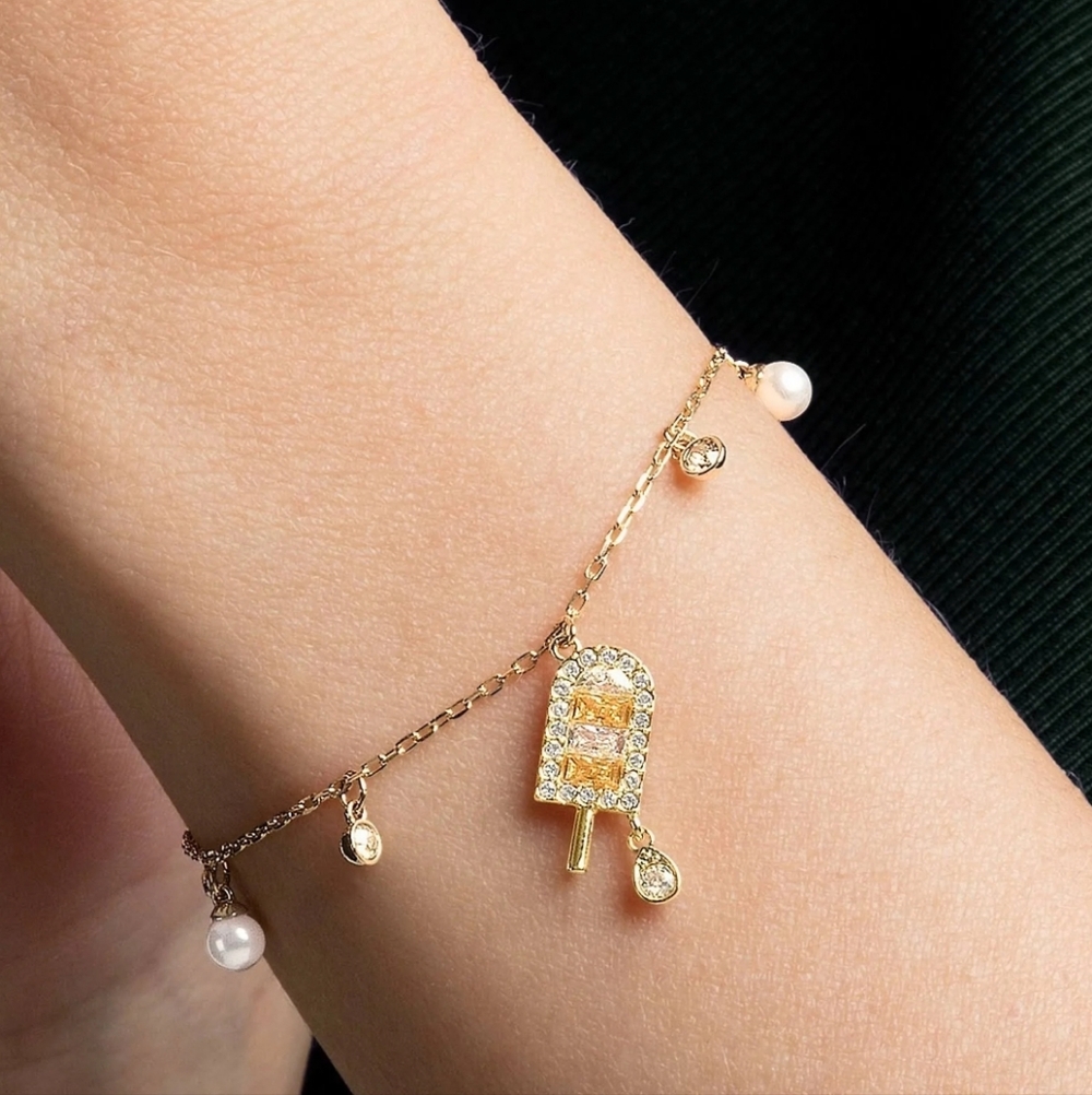 Swarovski No Regrets Gold Toned Popsicle Charm Bracelet- Good Condition
